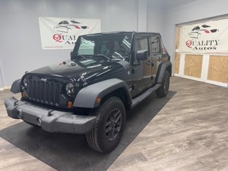 Used 2010 Jeep Wrangler Unlimited Sport image 1
