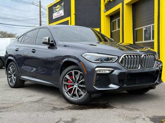 Used 2021 BMW X6 M50i w/ Executive Package image 1