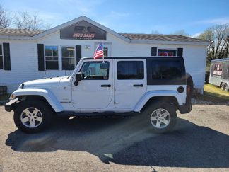 Used 2012 Jeep Wrangler Unlimited Sahara w/ Dual Top Group image 1