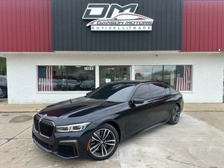 Used 2021 BMW 740i xDrive w/ M Sport Package image 1