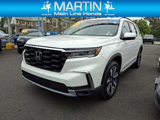 Certified 2025 Honda Pilot Touring image 1