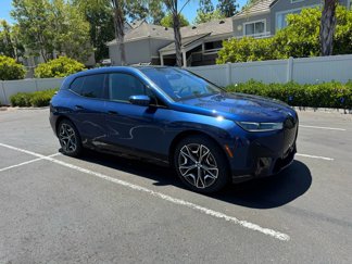 Used 2025 BMW iX xDrive50 image 1