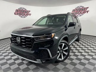 Used 2025 Honda Pilot Touring image 1