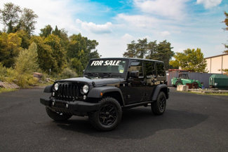 Used 2014 Jeep Wrangler Unlimited Sport image 1