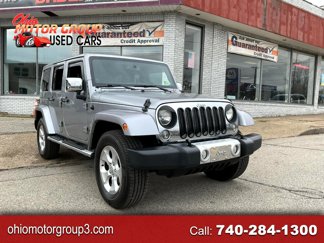 Used 2014 Jeep Wrangler Unlimited Sahara w/ Dual Top Group image 1