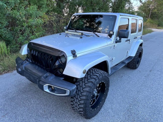 Used 2011 Jeep Wrangler Unlimited Sahara w/ Dual Top Group image 1