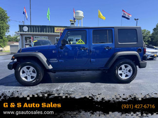 Used 2010 Jeep Wrangler Unlimited Sport image 1