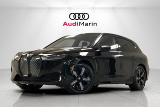 Used 2025 BMW iX xDrive50 w/ Premium Package image 1