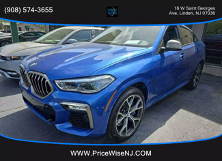 Used 2020 BMW X6 M50i w/ Executive Package image 1