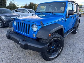 Used 2016 Jeep Wrangler Unlimited Sport image 1