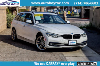 Used 2017 BMW 330i xDrive Wagon image 1