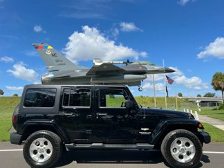 Used 2014 Jeep Wrangler Unlimited Sahara w/ Connectivity Group image 1