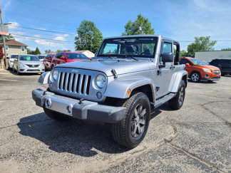 Used 2016 Jeep Wrangler Sahara image 1