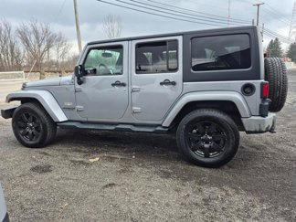 Used 2015 Jeep Wrangler Unlimited Sahara image 1