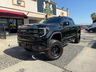 Used 2024 GMC Sierra 1500 AT4 w/ Technology Package image 1