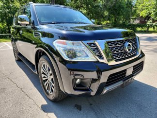 Used 2019 Nissan Armada Platinum w/ Captain's Chairs Package image 1