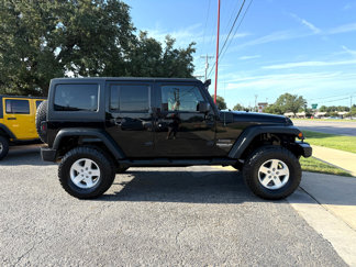 Used 2012 Jeep Wrangler Unlimited Sport image 1