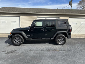 Used 2012 Jeep Wrangler Unlimited Sport image 1