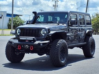Used 2024 Jeep Wrangler Sport image 1