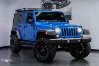 Used 2016 Jeep Wrangler Unlimited Sport w/ Connectivity Group image 1