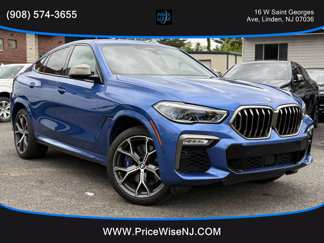 Used 2020 BMW X6 M50i w/ Executive Package image 1