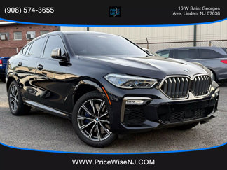 Used 2020 BMW X6 M50i w/ Executive Package image 1