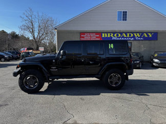 Used 2014 Jeep Wrangler Unlimited Sahara w/ Dual Top Group image 1