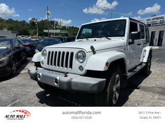 Used 2016 Jeep Wrangler Unlimited Sahara w/ Connectivity Group image 1