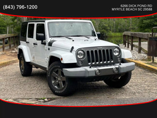 Used 2015 Jeep Wrangler Unlimited Sport image 1