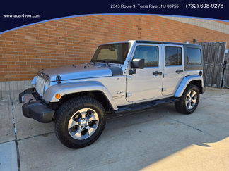 Used 2018 Jeep Wrangler Unlimited Sahara image 1