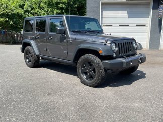 Used 2017 Jeep Wrangler Unlimited Sport image 1