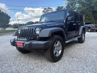 Used 2011 Jeep Wrangler Unlimited Rubicon w/ Dual Top Group image 1
