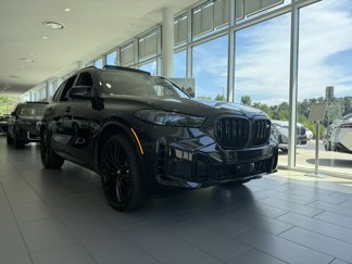New 2026 BMW X5 M60i image 1