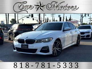 Used 2019 BMW 330i Sedan w/ M Sport Package image 1