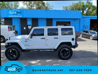 Used 2016 Jeep Wrangler Unlimited Sahara image 1