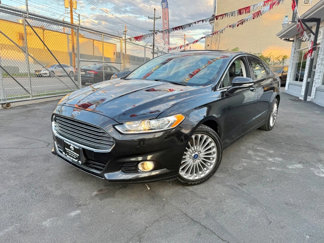 Used 2014 Ford Fusion Titanium image 1