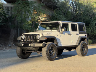 Used 2016 Jeep Wrangler Unlimited Sport image 1