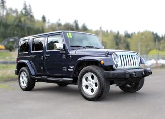 Used 2013 Jeep Wrangler Unlimited Sahara image 1