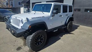 Used 2016 Jeep Wrangler Unlimited Sport image 1