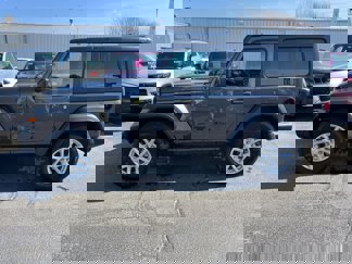 Used 2023 Jeep Wrangler Sport image 1