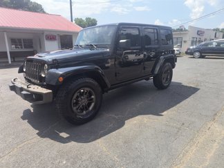 Used 2016 Jeep Wrangler Unlimited Sahara image 1