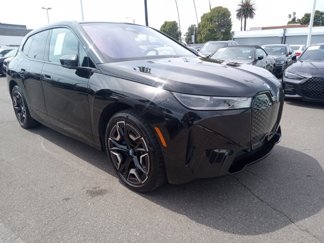 Used 2024 BMW iX xDrive50 w/ Sport Package image 1