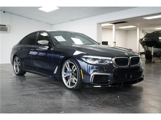 Used 2020 BMW M550i xDrive w/ Executive Package image 1