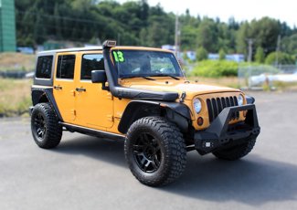 Used 2013 Jeep Wrangler Unlimited Sahara image 1