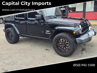 Used 2014 Jeep Wrangler Unlimited Sahara w/ Dual Top Group image 1