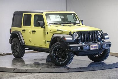 New 2023 Jeep Wrangler Unlimited w/ 8.4" Radio Group