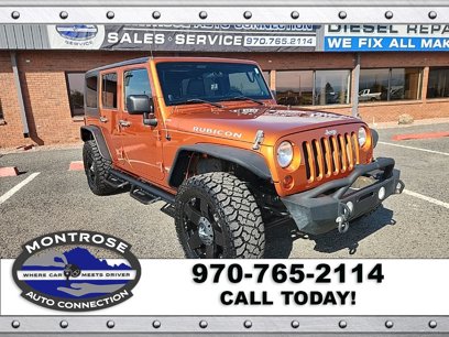 Used 2011 Jeep Wrangler Unlimited Rubicon w/ Dual Top Group