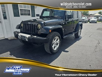 Used 2015 Jeep Wrangler Unlimited Sahara w/ Dual Top Group