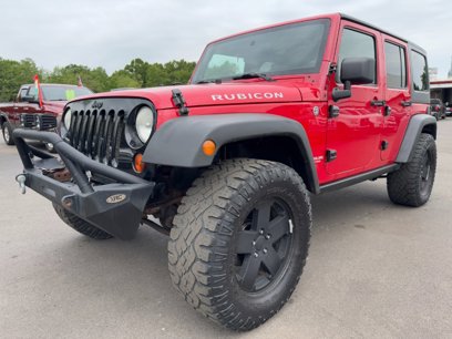 Used 2011 Jeep Wrangler Unlimited Rubicon w/ Dual Top Group