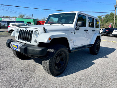 Used 2014 Jeep Wrangler Unlimited Sahara w/ Dual Top Group